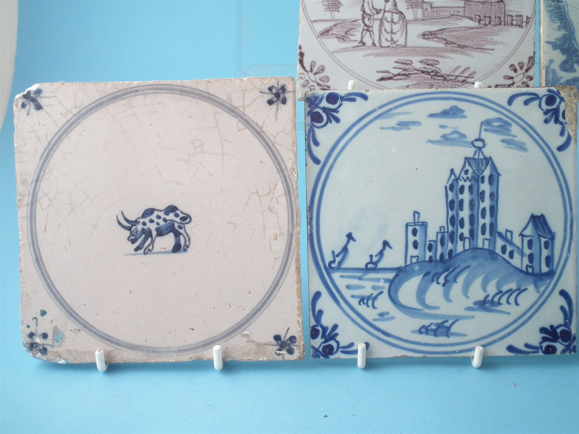 Group of Delft ware, to include five blue and white tiles and two others decorated in manganese, two - Image 2 of 9