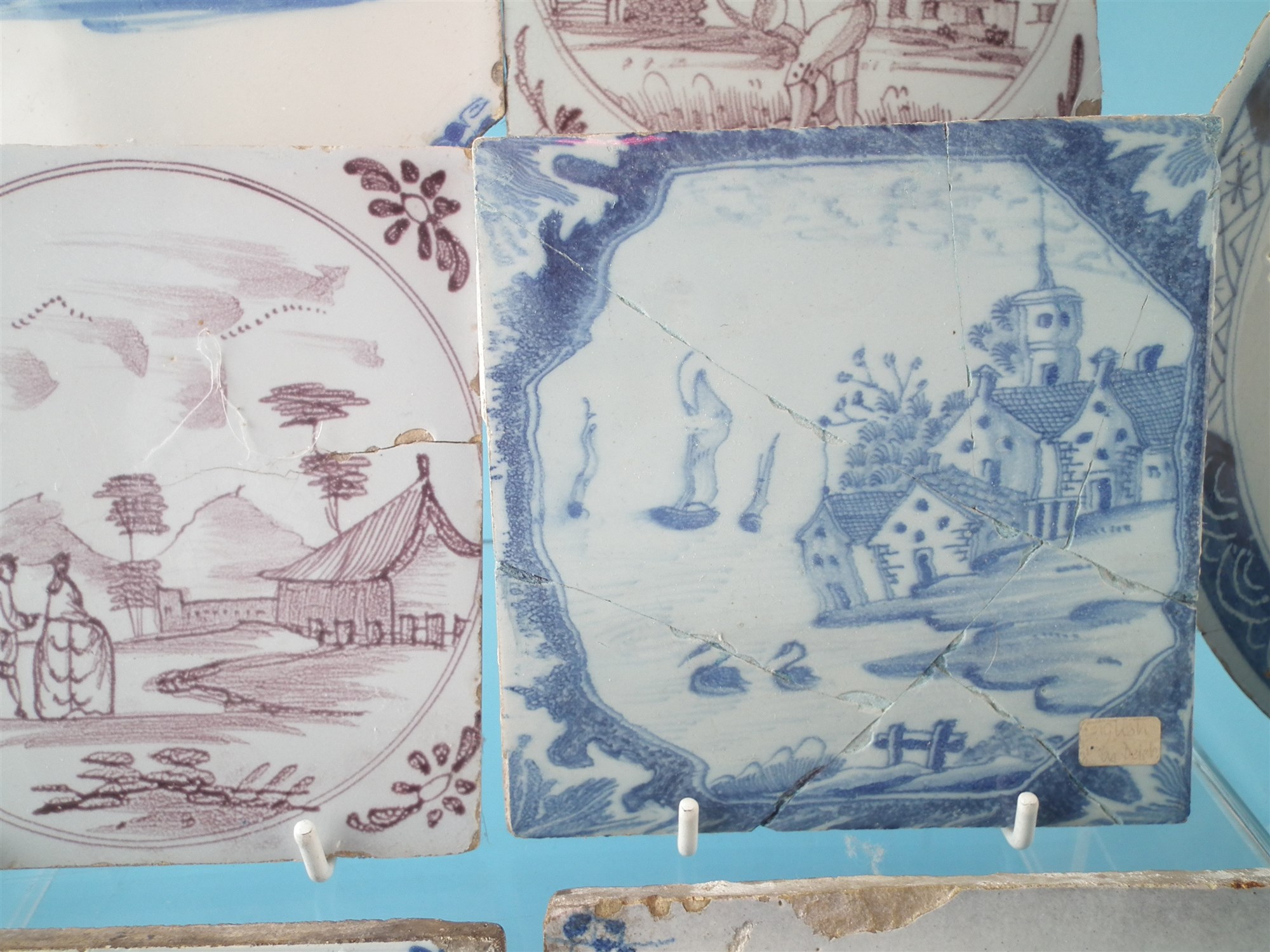 Group of Delft ware, to include five blue and white tiles and two others decorated in manganese, two - Image 4 of 9