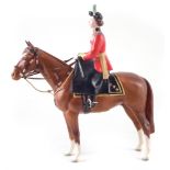 Beswick model of Queen Elizabeth II mounted on Imperial Trooping the Colour in 1957. 27cm high For a