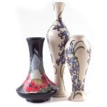 Three Moorcroft vases, decorated with Forever England after Vicki Lovatt, and Bluebell Harmony after