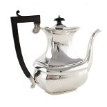 Silver coffee pot , plain polished body of curved rectangular form, black umbrella finial and
