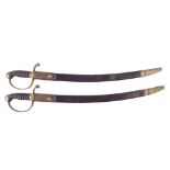 Pair of constabulary short swords by T. Baker London, with wire bound fish skin grips, brass