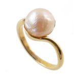 18ct gold pearl ring , the button shaped blister pearl approx. 8mm diameter, crossover shoulders,