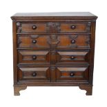 Early 18th century Jacobean design chest of four graduated drawers, rectangular top with moulded