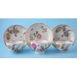 Three Liverpool Pennington tea bowls and saucers circa 1780 , painted with floral groups in