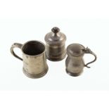 A 19th century pewter tappit hen, 1/2 pint, along with a 19th century pewter tankard, 1 pint and