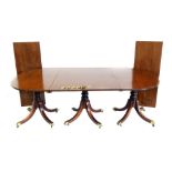 George III mahogany three pedestal regency design dining table, comprising to D-ends, central