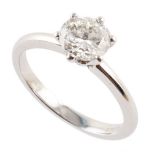 Diamond platinum solitaire ring , the round brilliant cut diamond measuring 1.03 carats, claw set to