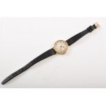 Ladie's vintage Longine's Art Deco yellow gold watch , engine turned pattern, round dial, arabic