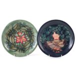 Two Moorcroft plates, decorated with Rainforest and Mamoura patterns after Sally Tuffin, both with