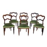 Set of six matching Victorian rosewood crown-back single dining chairs, each with moulded back and