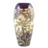 Moorcroft Tansy pattern vase, after Philip Gibson, with box, 18cm high For a condition report on