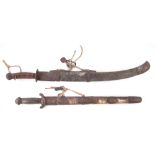 Chinese butterfly sword set, with horn grips, bronze guard modelled with a dog mask, contained