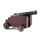 Bronze signal cannon, the 16 bore barrel bearing feint proof marks mounted on oak naval carriage,