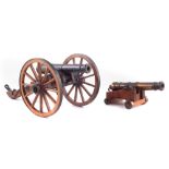 Two model cannons , the first a copy of a British Army early 19th century Napoleonic artillery gun