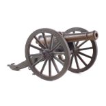 Model of a Napoleonic field gun , the bronze barrel mounted on green painted case iron base,