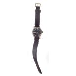 Omega military manual wind wrist watch, black face with Arabic numerals, luminous hand and baton