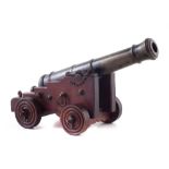 19th century bronze model cannon , mounted on mahogany naval carriage, barrel length 25cm, 27cm