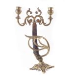 Sword hilt candelabra, with wire bound grip, early 20th century, 33cm