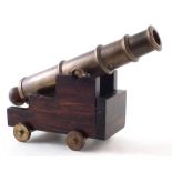 19th century bronze signal cannon, the barrel stamped A D 7 4 8, on naval base, barrel length 35cm,