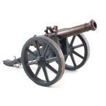 19th century bronze model cannon , the barrel with twin dolphin handles, mounted on British field