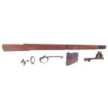 Lee Enfield rifle parts, to include a S.M.L.E. nose cap, early pattern magazine, trigger guard,