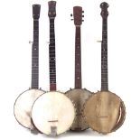 Four five string banjos , one by Fred Martin, the rest unmarked, the largest measures 90cm long