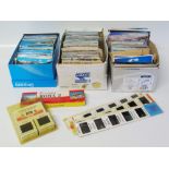 A quantity of mainly coloured late 20th century post cards and coloured slide Conditions reports are