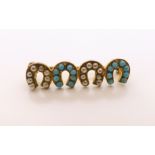 Victorian horse shoe design yellow metal pin brooch set with imitation pearls and turquoise.