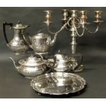 Plated Mappin & Webb tea pot, two similar tea pots, plated coffee pot and five branch candelabra and