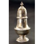 Silver sugar shaker on spreading foot, baluster form and urn shaped finial, height approx. 15cm,