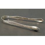 A pair of Georgian silver sugar tongs by Peter and William Bateman Conditions reports are not