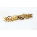 15ct gold garnet set Etruscan style brooch Conditions reports are not available for our Interiors