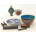 A collection of Chinese and Japanese items to include a tea bowl, seal, saucers, snuff box, small