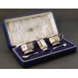 A boxed 3 piece silver cruet set by Mappin & Webb, to inlude a pepperette, salt and mustard pot,