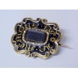 A Victorian morning brooch, black enamel with front compartment Conditions reports are not available