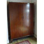 Mahogany "Compactum" wardrobe Condition reports are not available for our Interiors Sale.