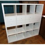 Modern white melamine lounge storage display unit enclosing 8 drawers, 147cm wide, 147cm tall and