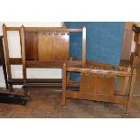 A pair of Victorian style single walnut bedsteads Condition reports are not available for our