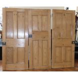 Three pine panelled doors, 81 x 195, 73 x 194 and 81 x 196cm. Condition reports are not available