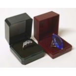 Mystic topaz three stone 9ct white gold ring together with a blue stone set silver ring. Condition