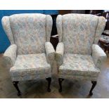 A pair of modern wing back fireside chairs on front cabriole legs Condition reports are not