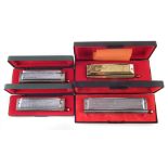 Four harmonicas, three by Hohner to include two Super Chronmonicas in C and G, The 64 Chromonica