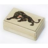 Meiji Period ivory box with detachable lid baring figure of a rampant lion 5.5 x 3.5 x 2cm.