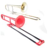 Stagg alto trombone , with case, also a Jiggs P. Bone in canvas case, the hard case measures 73cm