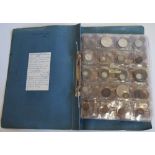 Two large albums of British and foreign world coins to include George II, III, V, VI, Victoria,