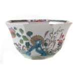 Worcester bowl circa 1753 , of octagonal form, painted with flowers and rockwork in a famille