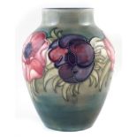 Moorcroft Anemone pattern vase 18cm high For a condition report please visit our website www.