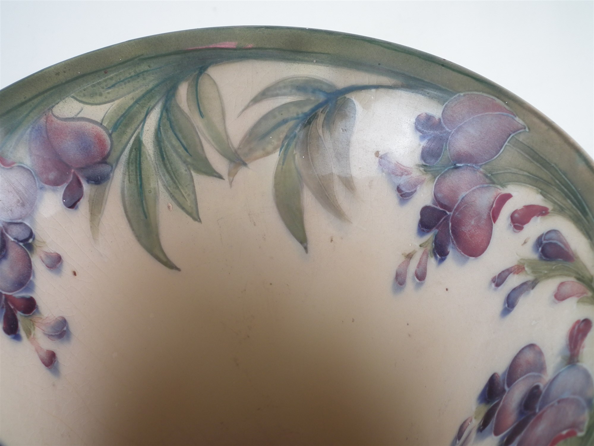Moorcroft wisteria pattern vase , decorated on a cream coloured back ground with green borders, 22cm - Image 2 of 6