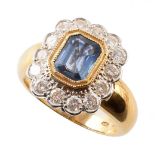 Sapphire and diamond cushion shaped 18ct gold ring , central rectangular cut cornered blue